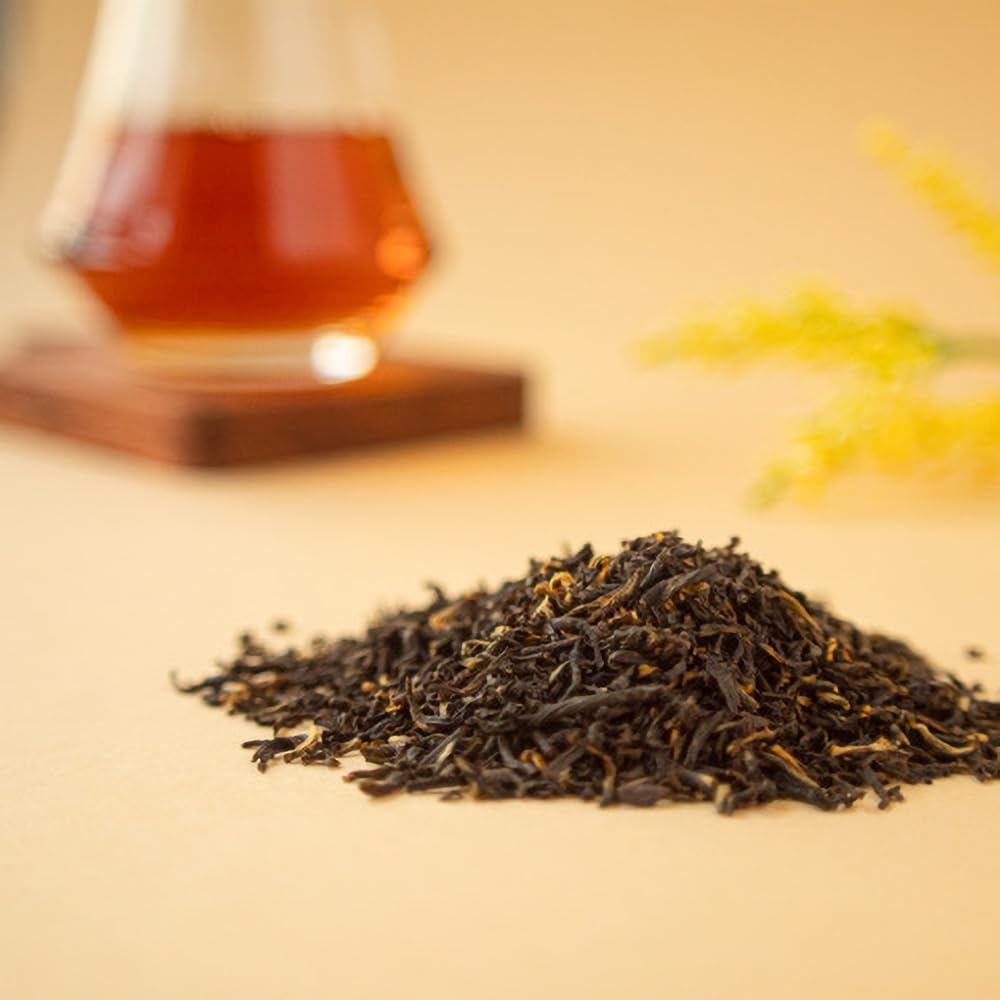 Organic Positively Tea Company Yunnan tea packaging teaser indicating gift-ready presentation.