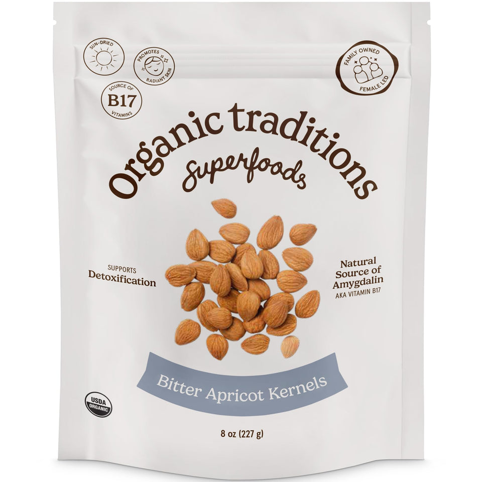 Organic Traditions apricot kernels on front label, ready for mindful snacking.