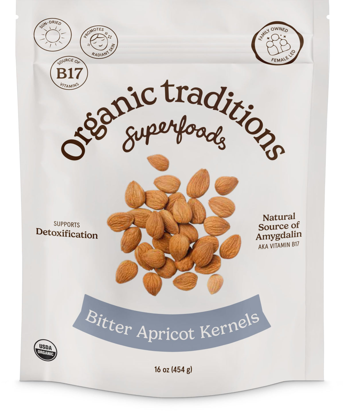 Organic Traditions apricot kernels sundried bowl show natural texture for mindful snacking.