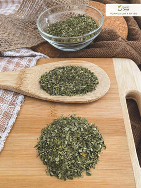 Organic Way Moringa leaves on a shelf for organized display of natural botanicals.