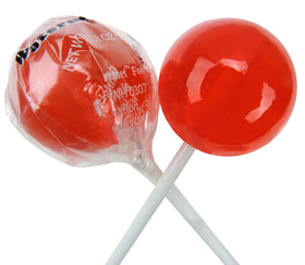 Original Gourmet Watermelon Lollipops close-up showing glossy, seedless sweetness.