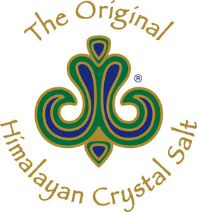The Original Himalayan Crystal Salt mineral sparkle on a glass surface.
