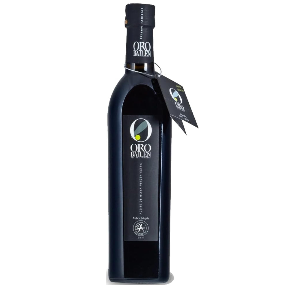 Oro Bailen Reserva Familiar Picual bottle pour with robust peppery finish for dipping