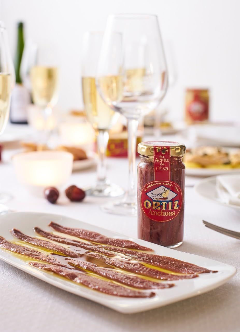 Ortiz anchovies in olive oil filets closeup: firm texture for pizza toppings