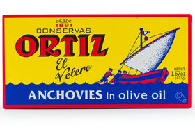 Ortiz anchovies on a baguette illustrate a quick, savory starter.