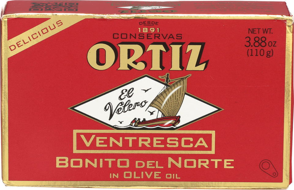 Ortiz ventresca white tuna belly in olive oil tin, silky texture ready for a baguette.