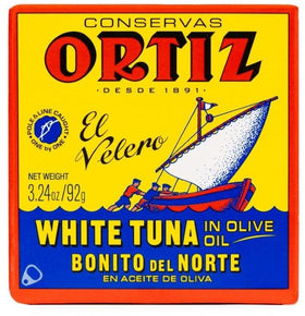 Ortiz white tuna open can closeup illustrating moist flaky tuna