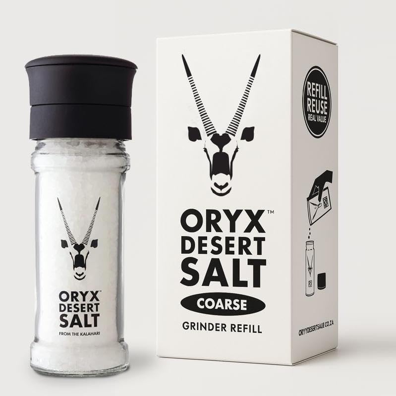 Oryx Desert Salt grinder close-up with coarse salt for precise seasoning.