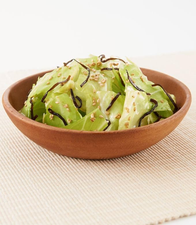 OSK Kurakon served over rice and greens to showcase versatility.