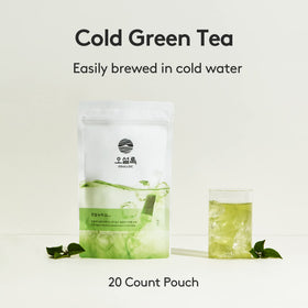 Close-up of Osulloc tea bags showing compostable packaging for eco-friendly brewing.