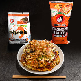 Otafuku Okonomi Sauce plated with sides for balanced flavor pairing.