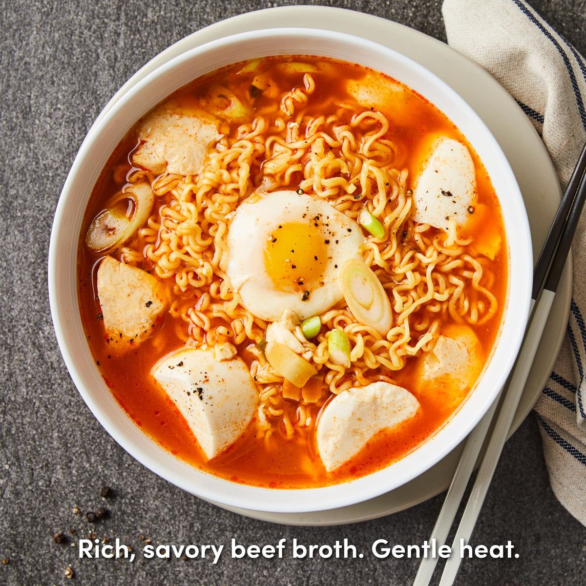 Uncooked OTOKI Jin Ramen Mild Cup noodles in a cup