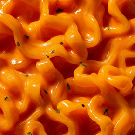 OTOKI spicy chili cheddar flavor image highlighting bold taste and rich sauce.