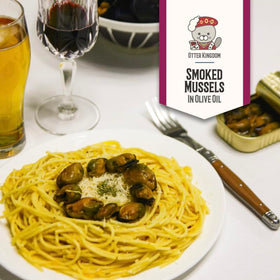 Otter Kingdom mussels in olive oil with glossy pour for serving.