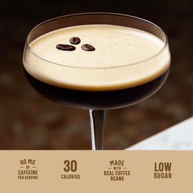 Owen's Espresso Martini Mix being poured with nitro foam for smooth texture