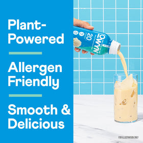 OWYN Smooth Vanilla protein shake scoop beside the bottle.