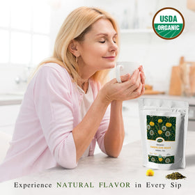 Steaming cup of Oxify Dandelion Root Tea with earthy aroma