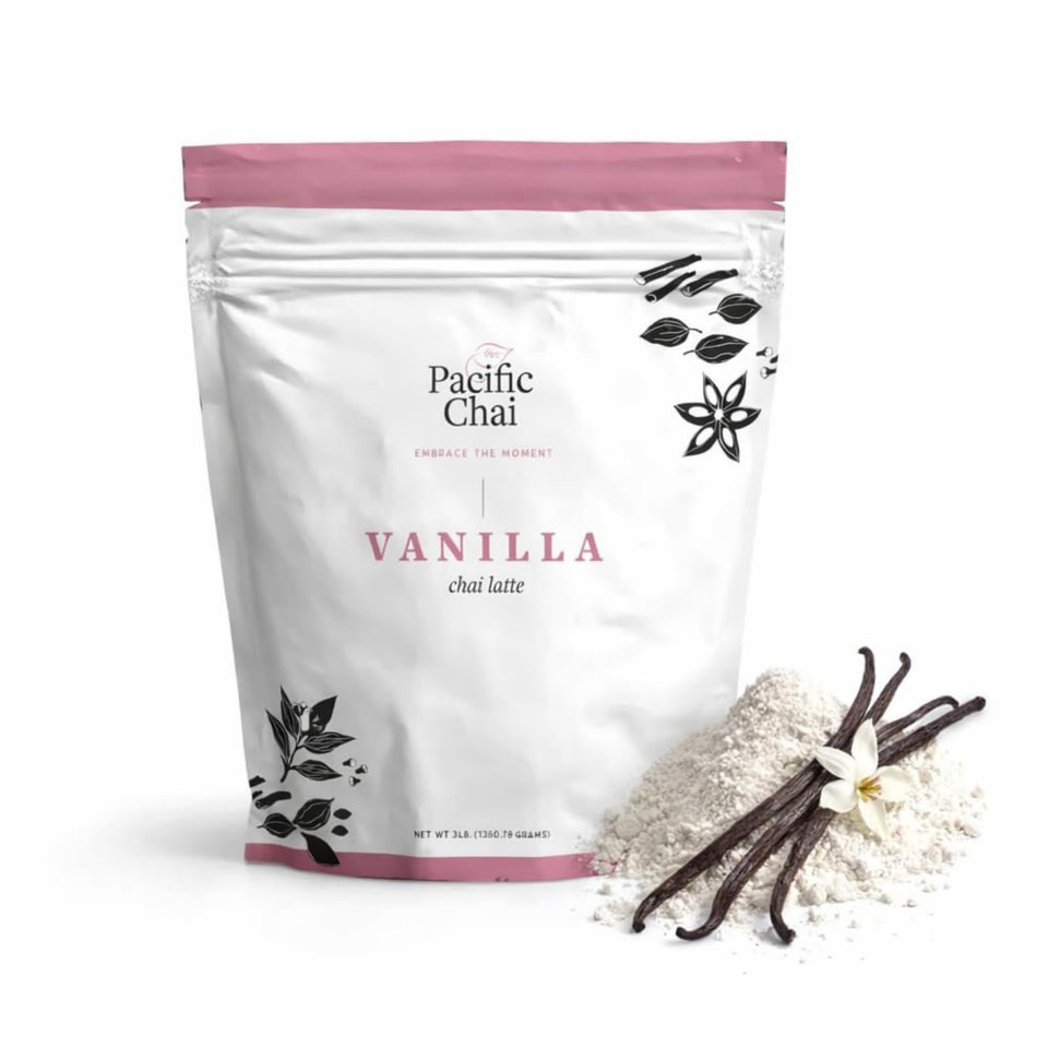 Pacific Chai Vanilla Chai Latte Mix bottle on a kitchen shelf, ideal for cozy mornings.