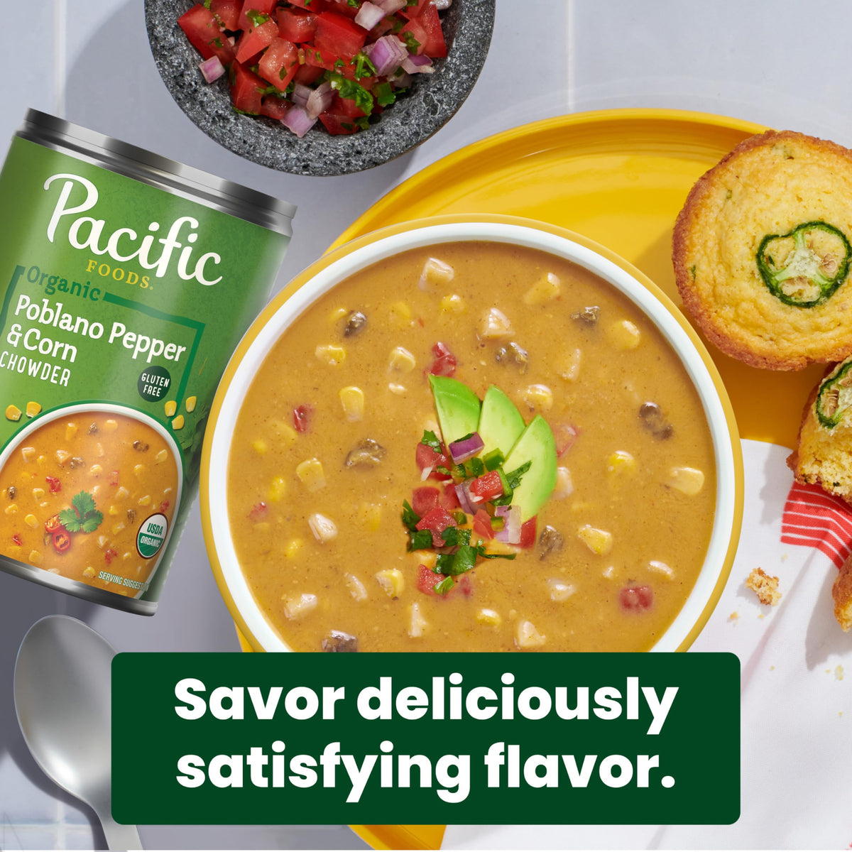 A bowl of Pacific Foods chowder topped with herbs, ideal for quick lunches.