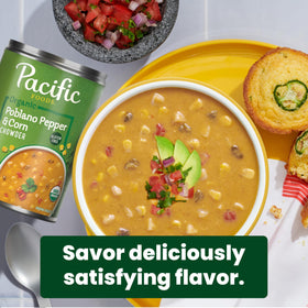 A bowl of Pacific Foods chowder topped with herbs, ideal for quick lunches.