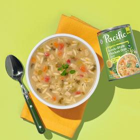 Pacific Foods orzo soup ingredients close-up; non-GMO, organic promise.