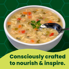 Pacific Foods 12-pack canned soup on shelf; easy pantry stocking.