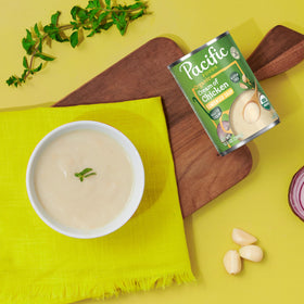 Pacific Foods Organic Cream of Chicken Soup in a steaming bowl, creamy comfort