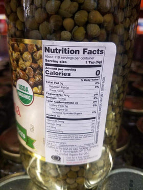 Paesana capers jar view showcasing vibrant green pearls and bright, salty flavor