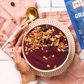 Paleonola pecans and almonds close-up showing natural nuts for paleo-friendly snacking.
