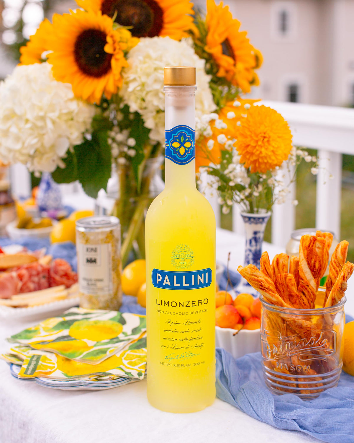 Guests enjoy inclusive drinks with Pallini Limonzero at a home party