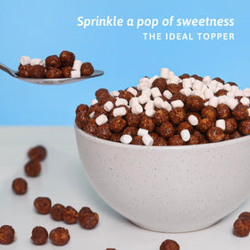 Palm and Plenty marshmallow bits swirling in hot chocolate for cozy flavor