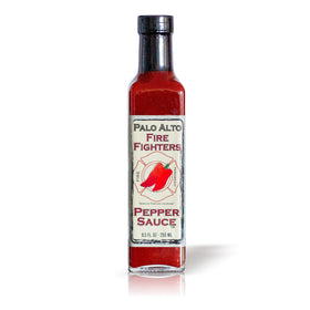 Palo Alto Firefighters Pepper Sauce bottle on shelf for grilling.