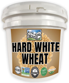 Palouse Brand hard white wheat berries in bucket front, ready for long-term storage and use