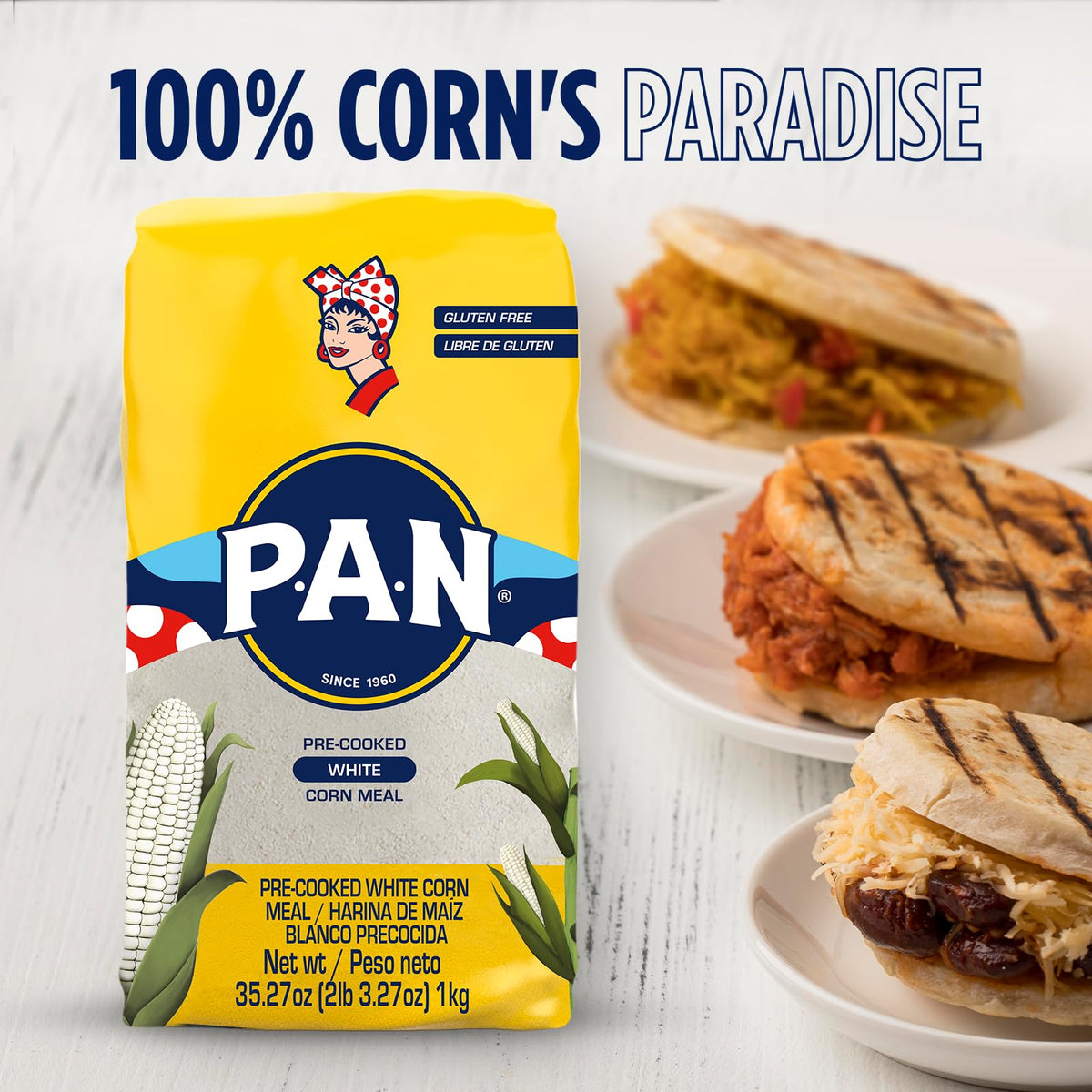 Arepas cooking on a griddle, showcasing even browning and texture.