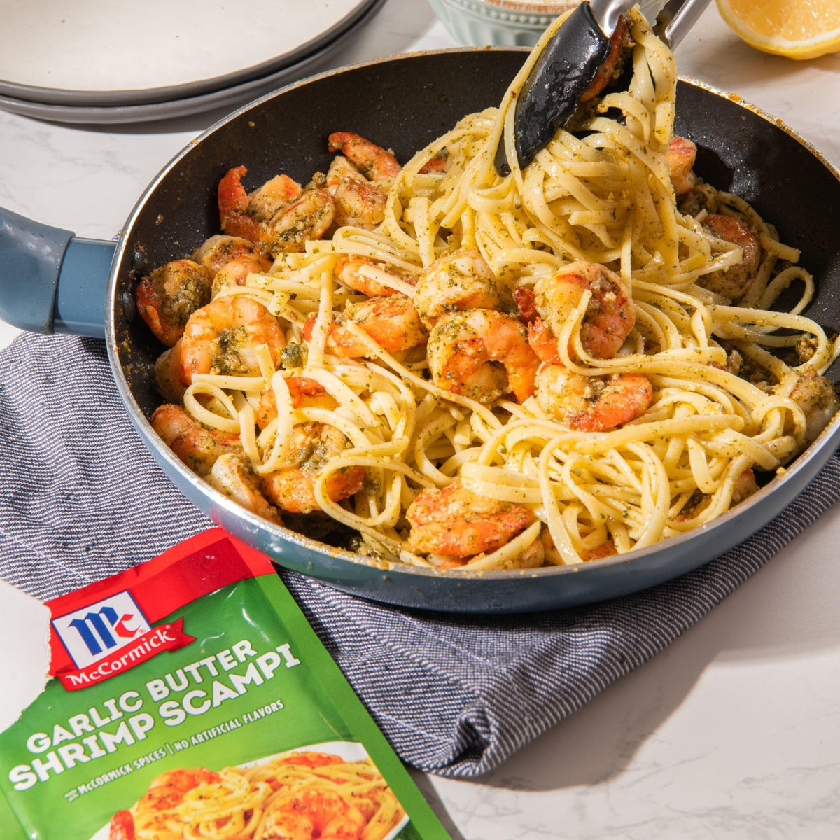Pan with McCormick spices and shrimp demonstrates quick sauté convenience.