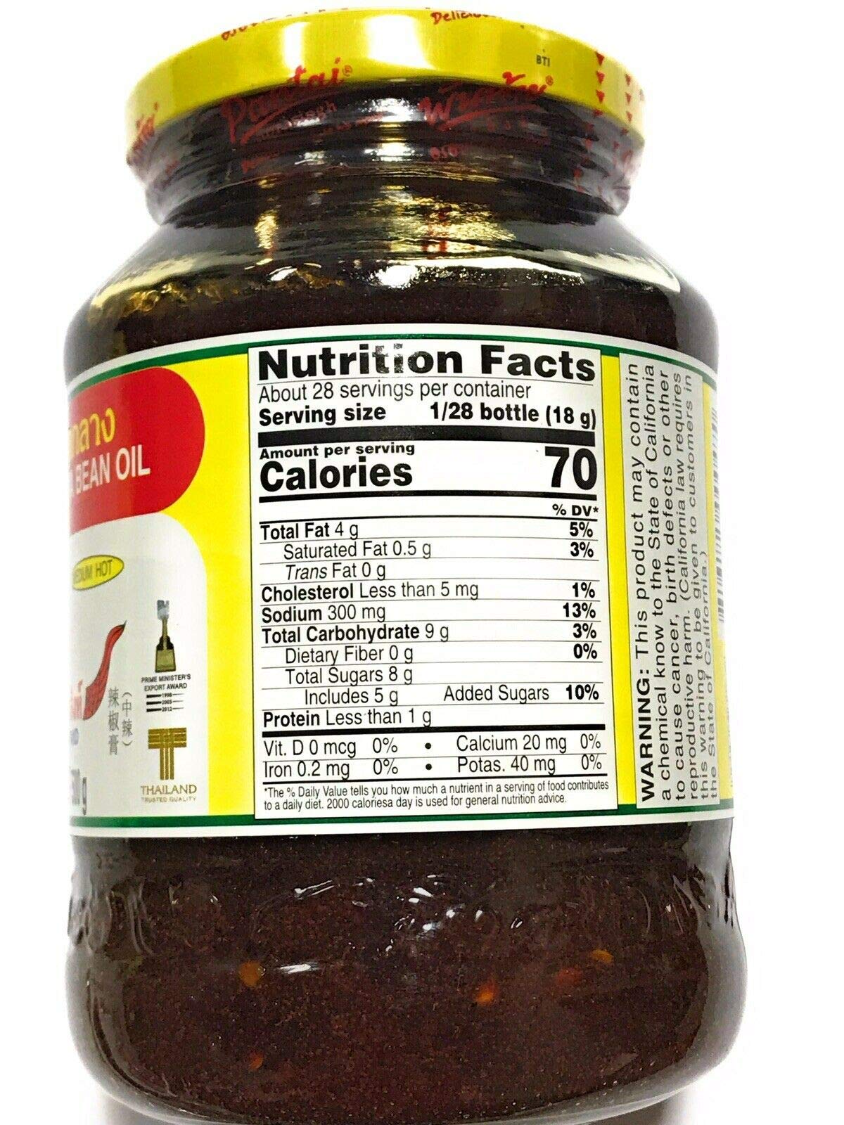 Pantai chili paste with soya bean oil label closeup, showcases heat and cooking versatility.