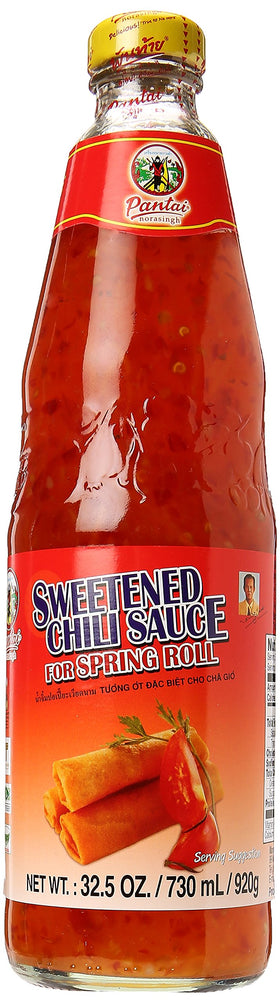 Pantai Sweetened Chili Sauce bottle beside fresh spring rolls for dipping