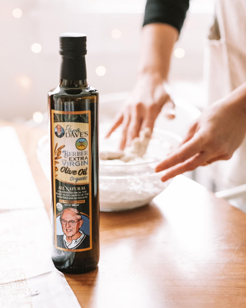 Papa Dave's olive oil bottle on a kitchen counter, ready for everyday cooking.