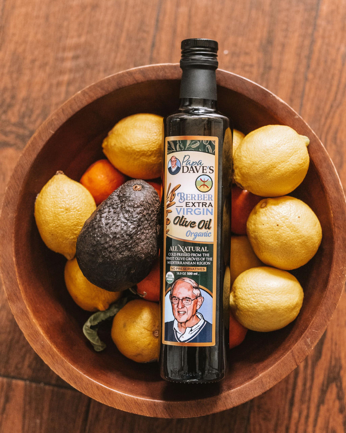 Papa Dave's olive oil shimmering in a skillet during high-heat sauté.