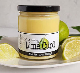 Paradigm Foodworks lime curd on a tea-time setup with scones and teacups.