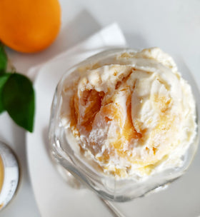 Paradigm Foodworks Orange Curd on scone-topping with tangy sweetness.