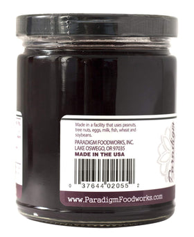 Paradigm Foodworks Seedless Marionberry Jam close-up; glossy texture invites spoonfuls of fruity sweetness.