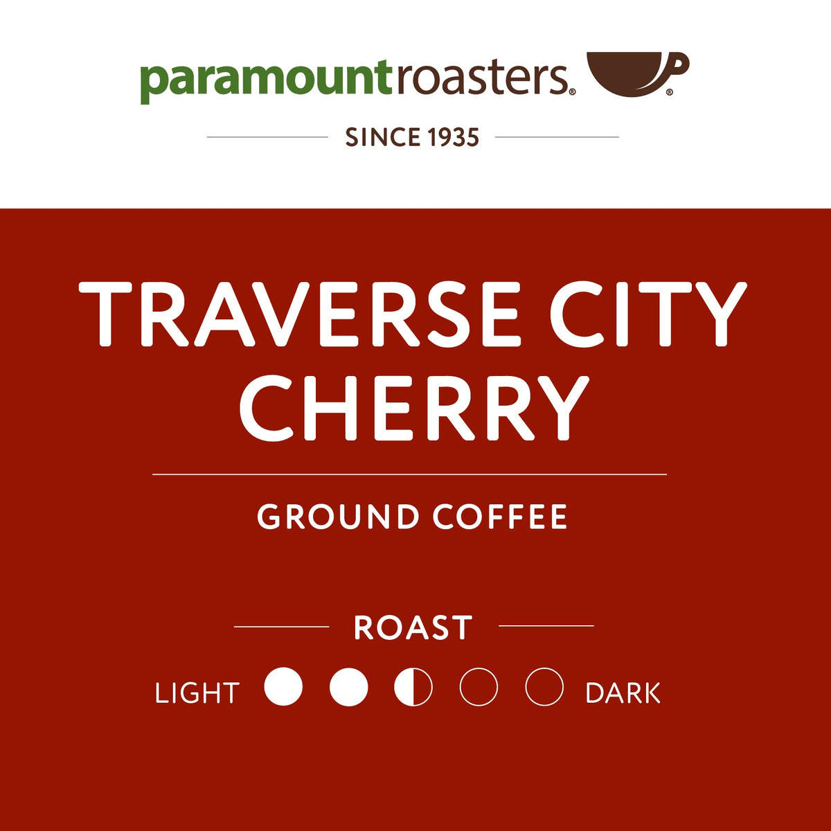 Scoop beside the Paramount Roasters Traverse City Cherry bag on a kitchen counter.