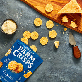 ParmCrisps with wine glass; elegant snack pairing option.
