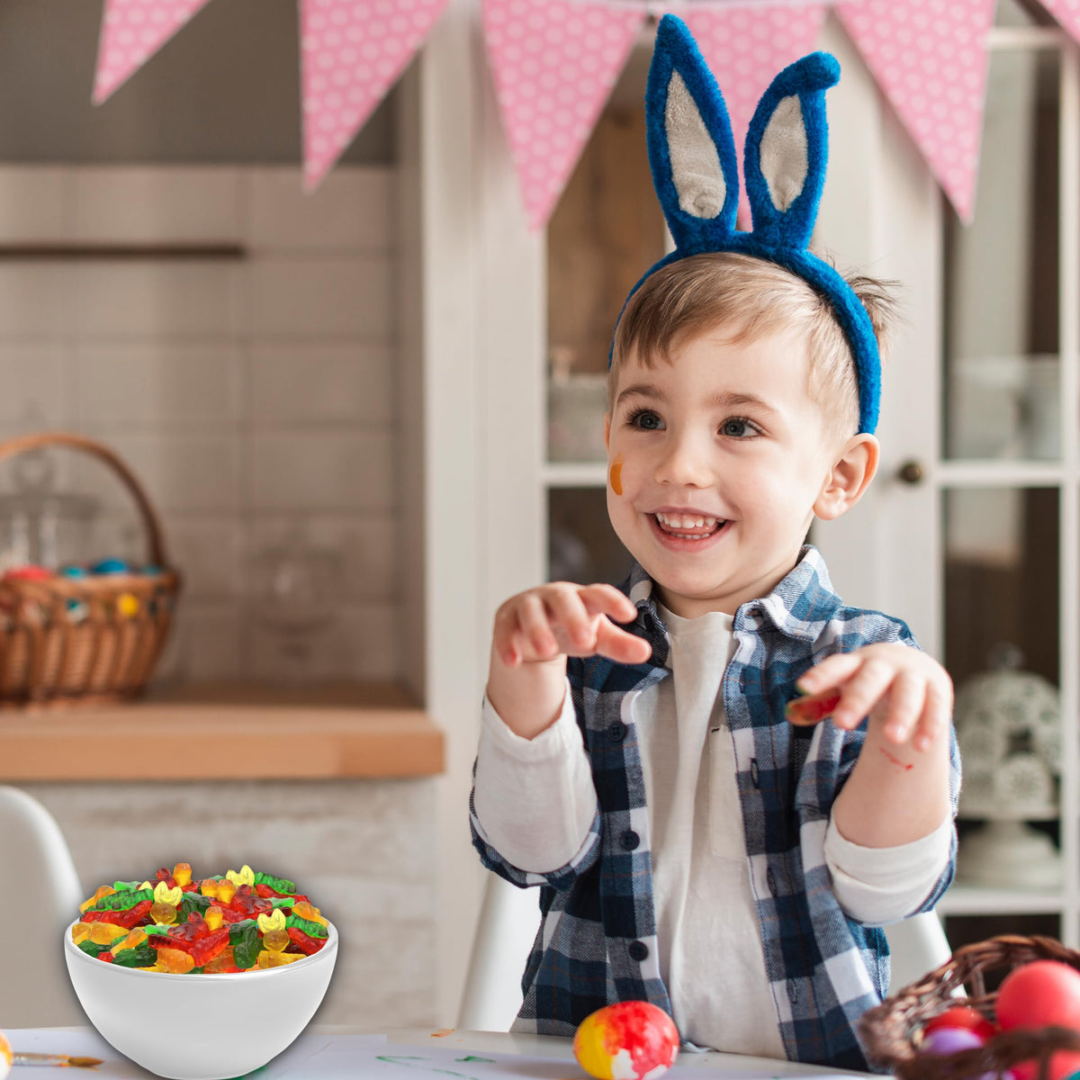 Partypom bunny gummies on a dessert table for cheerful spring celebration.