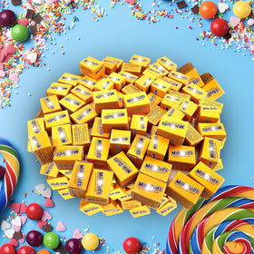 Partypom Milk Duds party favors setup for gift bags.