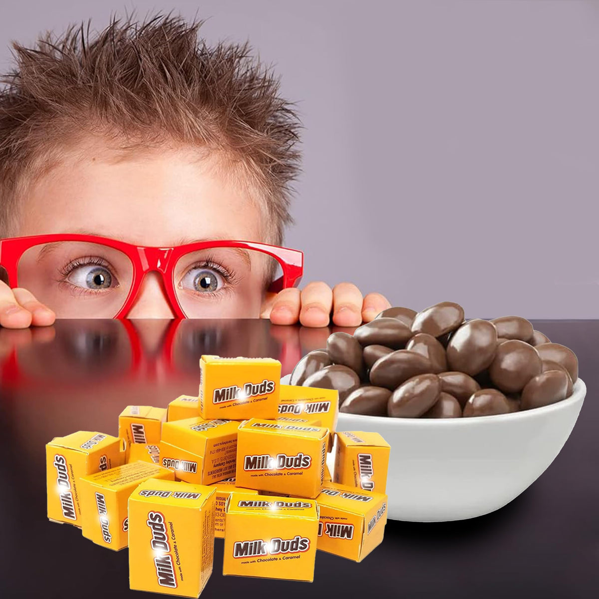Partypom Milk Duds snack table display promotes quick grabbing.