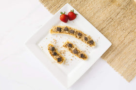 Pasokin crumbs on berries to elevate flavor and texture.