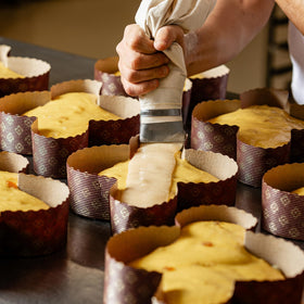 Pasticceria Fraccaro 1932 colomba-slice-on-plate, shareable dessert for gatherings