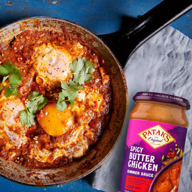 Serving bowl of Patak's sauce ready with rice or naan